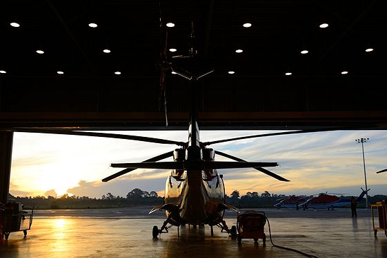 Helicopter facing the sunset